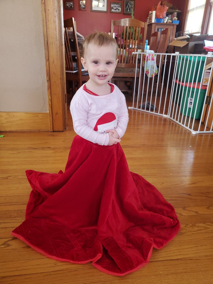 cyclone811's tweet photo. I put forth that my daughter in a tree skirt is the cutest thing of the whole year. https://t.co/rNy5ZJQ8pz