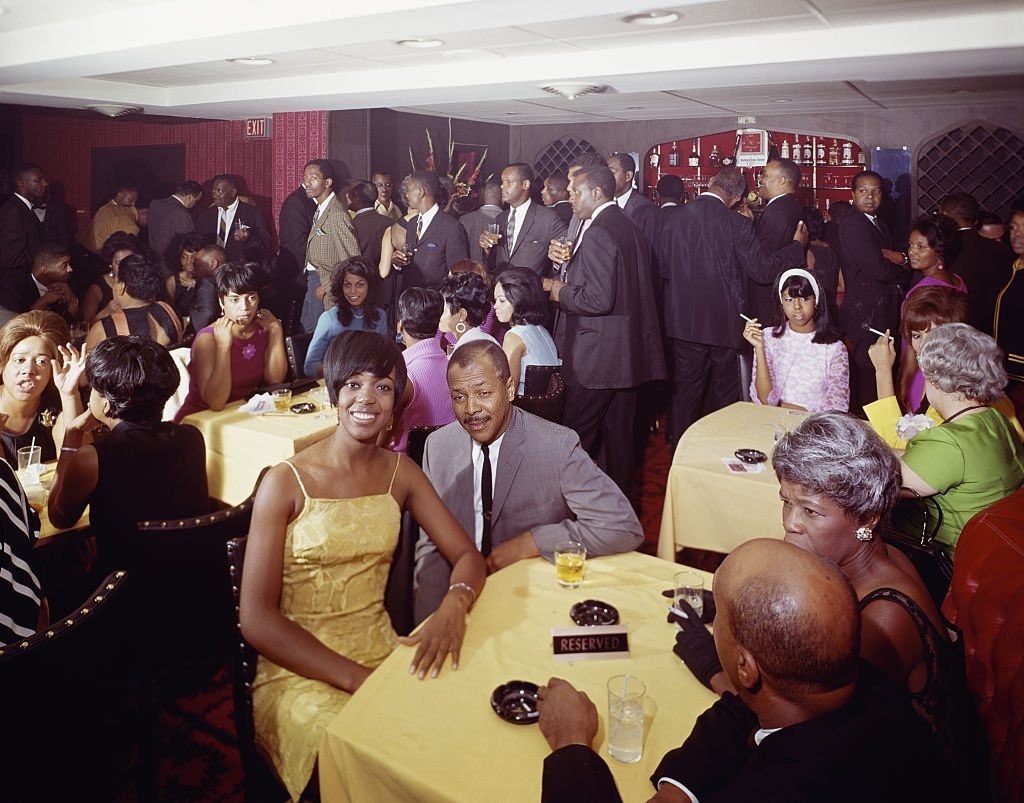 Columbia Heights, Washington DC (1965). Couples enjoy a night out at the Black-owned Pitts Motor Inn Lounge. Photographed by Eric Bard.