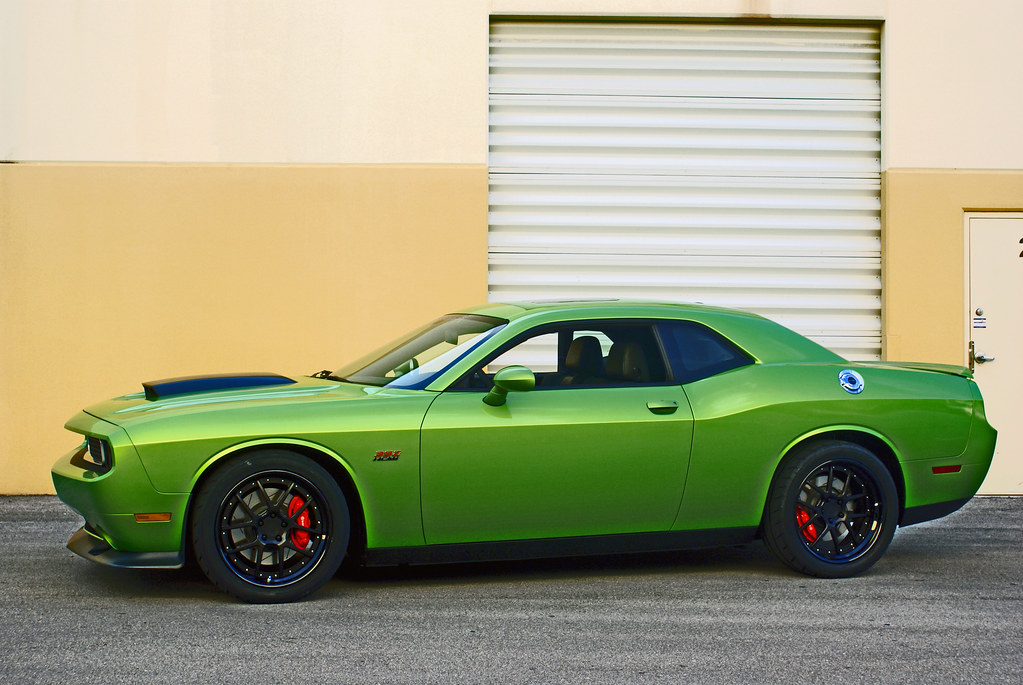 Speedlogix's tweet photo. As we begin a new year, we are reflecting on the past.  Here's a pic of our 2011 GWE SRT from back in the day.  Love these custom ADV.1 wheels, and of course the 6-speed manual transmission.

#speedlogix #modthem #gwe #challenger https://t.co/YrGwG3TJsg