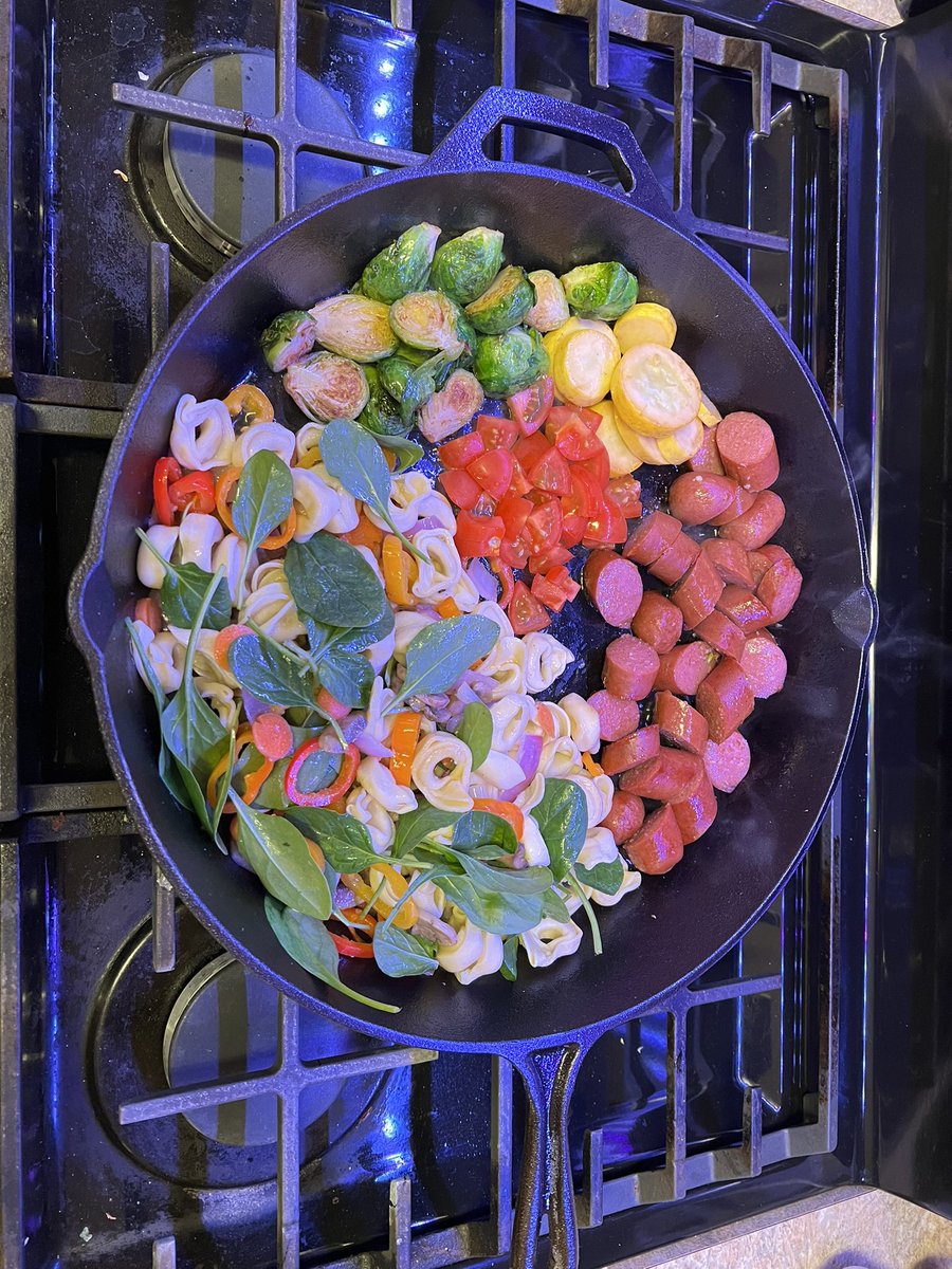 Jimspieks's tweet photo. Broke in my new big cast iron pan! Supper for my wife and kids (I didn’t make enough to for me so I had fish). Fried tortellini, sausage, brussel sprouts, with sparkling grape juice. My wife and kids always eat before me #twittersupperclub #castiron #colorfulmeals #freshveggies https://t.co/TLHS4FkGF6