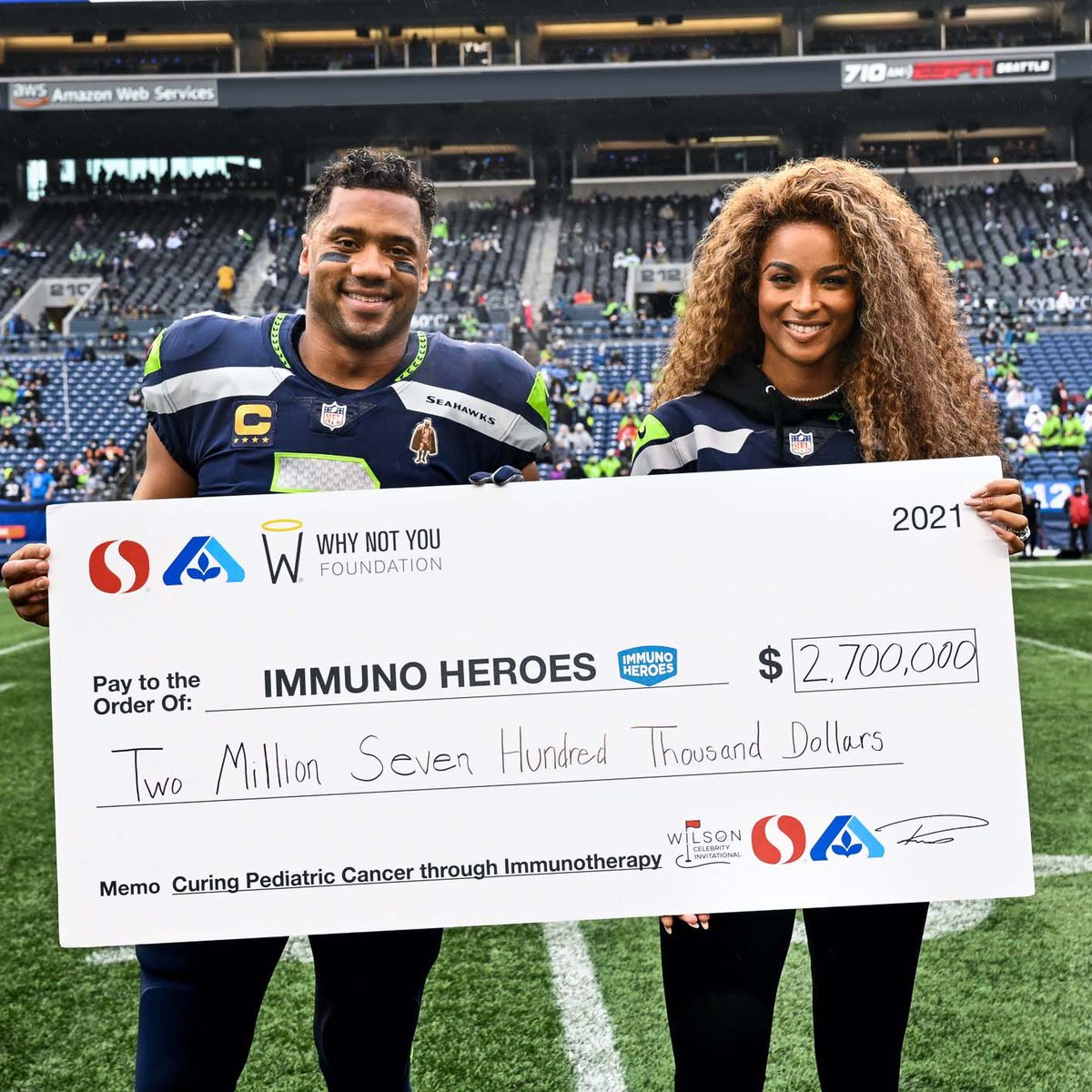 .@DangeRussWilson and @Ciara presented this $2.7 million check to the @seattlechildren #ImmunoHeroes campaign earlier today.

It’s a joy to be a part of this campaign every year✨ Thank you to all @Safeway customers and employees who helped make this happen! #WhyNotYou #WhyNotUs