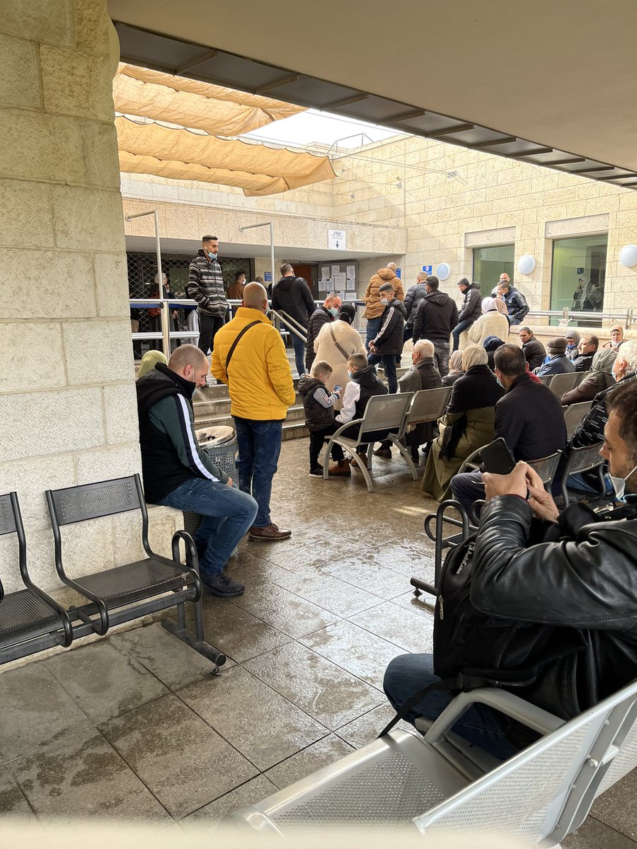 Palestinian elderly and kids in #Jerusalem waiting in the cold and rain outside the ministry of interior for their turn.
