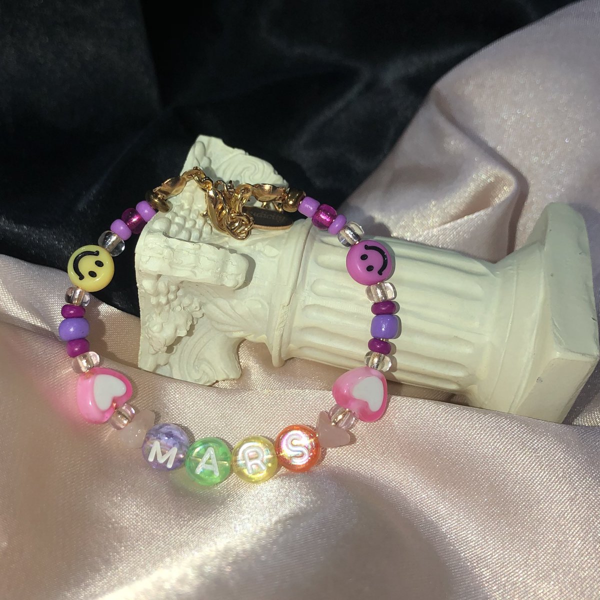 Mars Beaded Bracelet 
Inspired by Olivia Rodrigo’s sour phone strap
This design request was made from : 
Fee