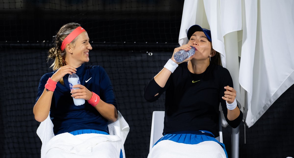 WTA's tweet photo. Dubs partners today, singles opponents tomorrow 😅

@paulabadosa &amp; @vika7 defeat top seeds Aoyama/Shibahara, 6-4, 6-2!

#AdelaideTennis https://t.co/o2sGmLMKYm