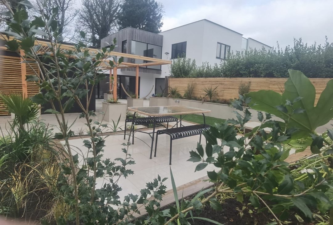 Our #stives site completed @MarshallsReg symphony barley paving #larchcladding and #artificialgrass giving a clean cut #comtporygarden