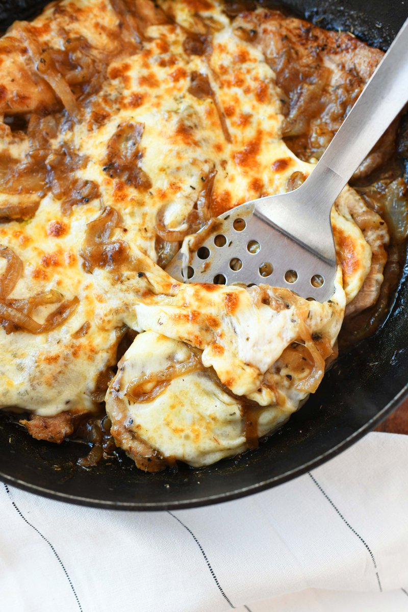 #AD French Onion Pork Chops? These chops are seasoned, &amp; air fried then finished in onions caramelized &amp; simmered in beef broth, sherry wine, and thyme. Topped with cheese, they're broiled to a  perfection!  #NationalPorkBoard #PorkCheckoff <a href="/NationalPork/">NationalPork</a>
 
savvysavingcouple.net/air-fryer-fren…