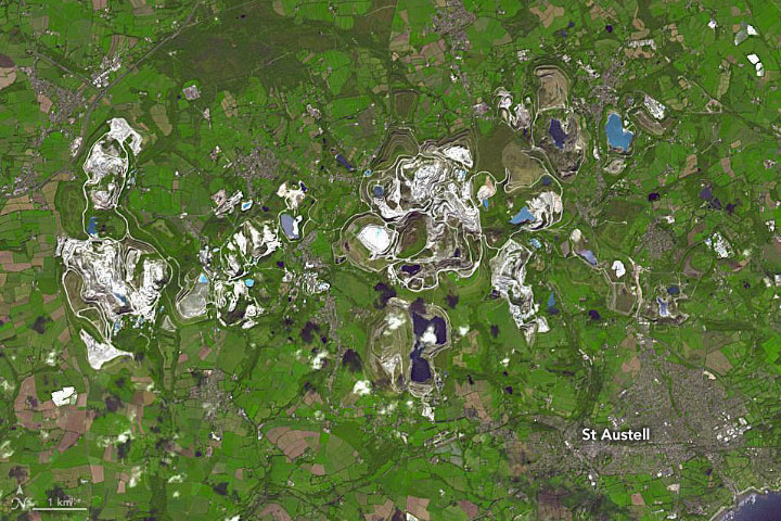 NASAEarth's tweet photo. The discovery of kaolinite clay deposits in southwest England in the mid-1700s launched the country's porcelain industry and left its mark on the Cornish landscape. https://t.co/1JVv8uPHL6 https://t.co/euUZzDeVMO
