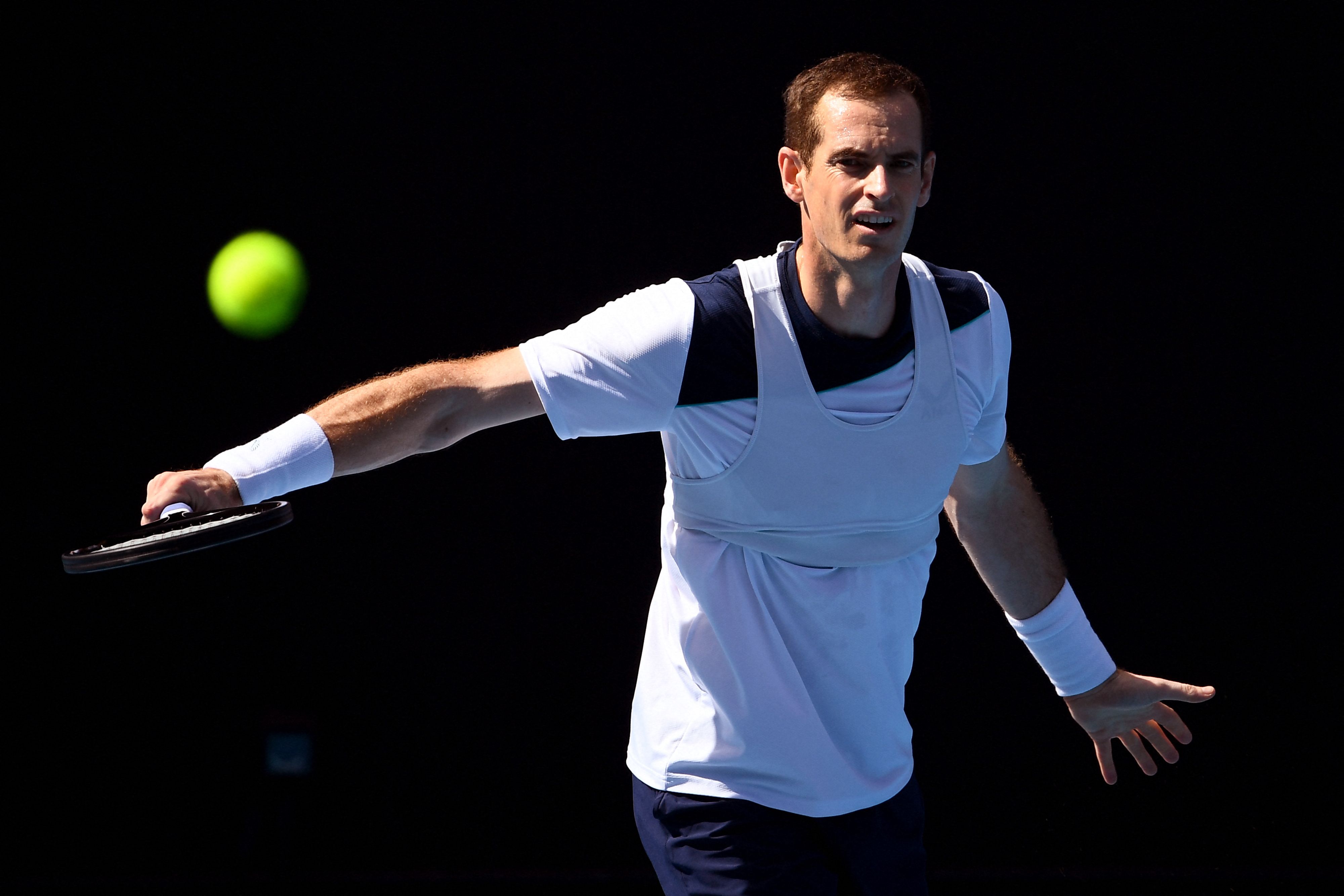 Andy Murray hits a backhand on Rod Laver Arena.