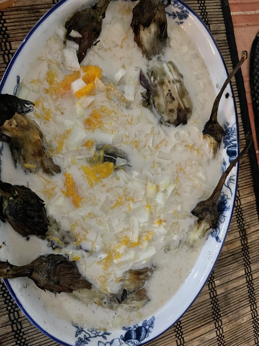 Nadokoulu's tweet photo. “Baigani Tavu” (eggplant cooked over fire) with coconut milk, onions and mangoes. Life and diet is so simple #TeamFiji Go Local Organic mada sometimes. https://t.co/qqnj0FOg73