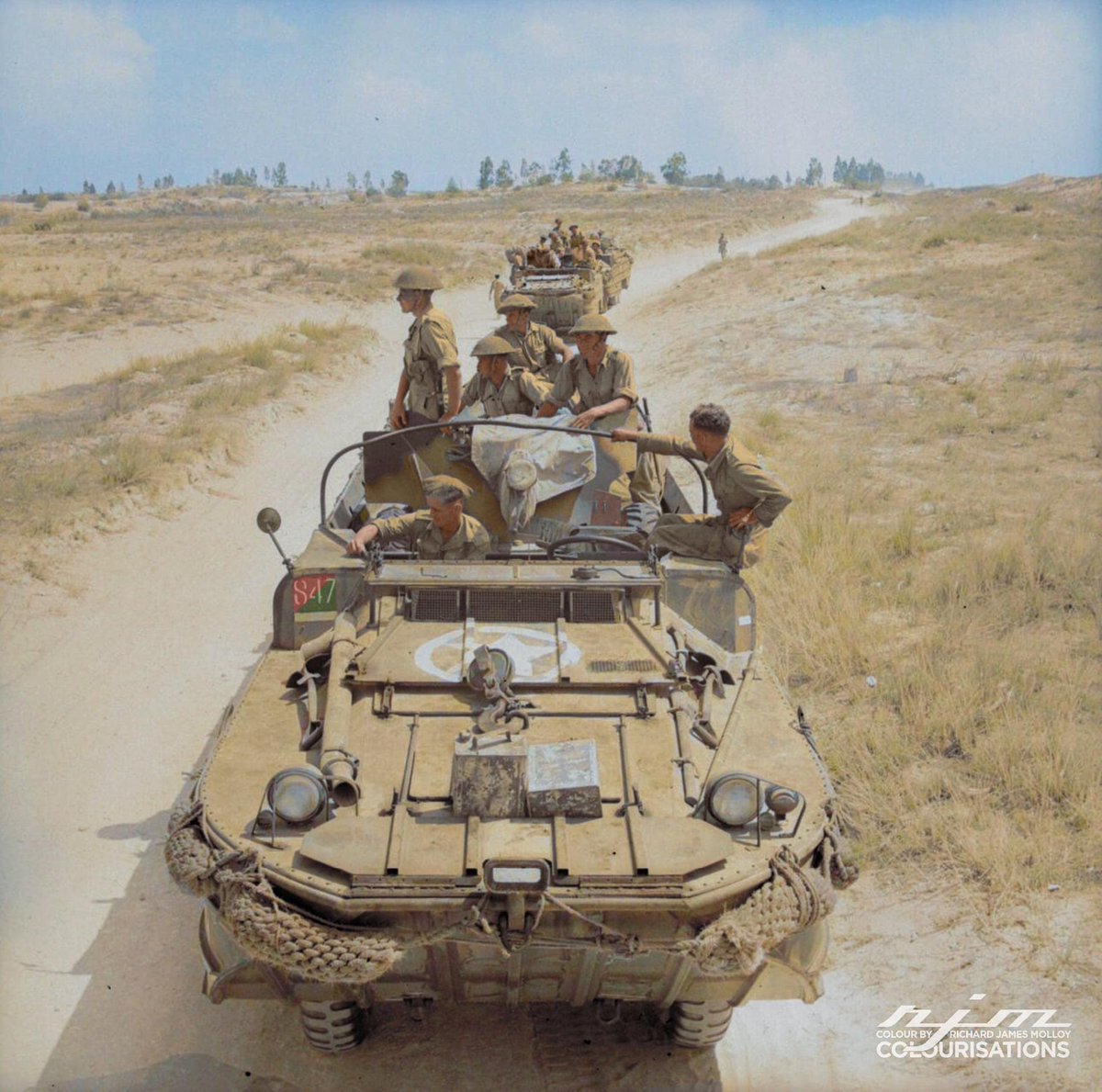 DUKWs carrying 6-pdr anti-tank guns during training in North Africa, 31 August 1943.
Colour by RJM