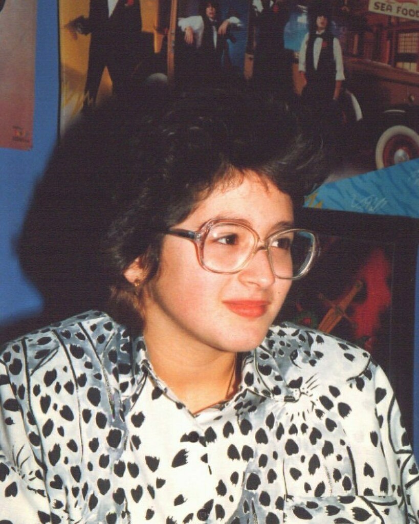 Nummymuffin's tweet photo. Pretty sure this was early 1987, in my cousin’s bedroom, so I was almost 13. The cat print shirt is still quite on brand for me. 😂 #very80s #niceshoulderpads https://t.co/5oMKInXPcD https://t.co/AJvI4CxpNe