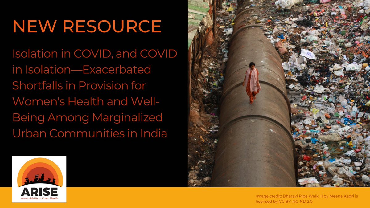 A woman walks on a large pipe amid piles of rubbish in Dharavi