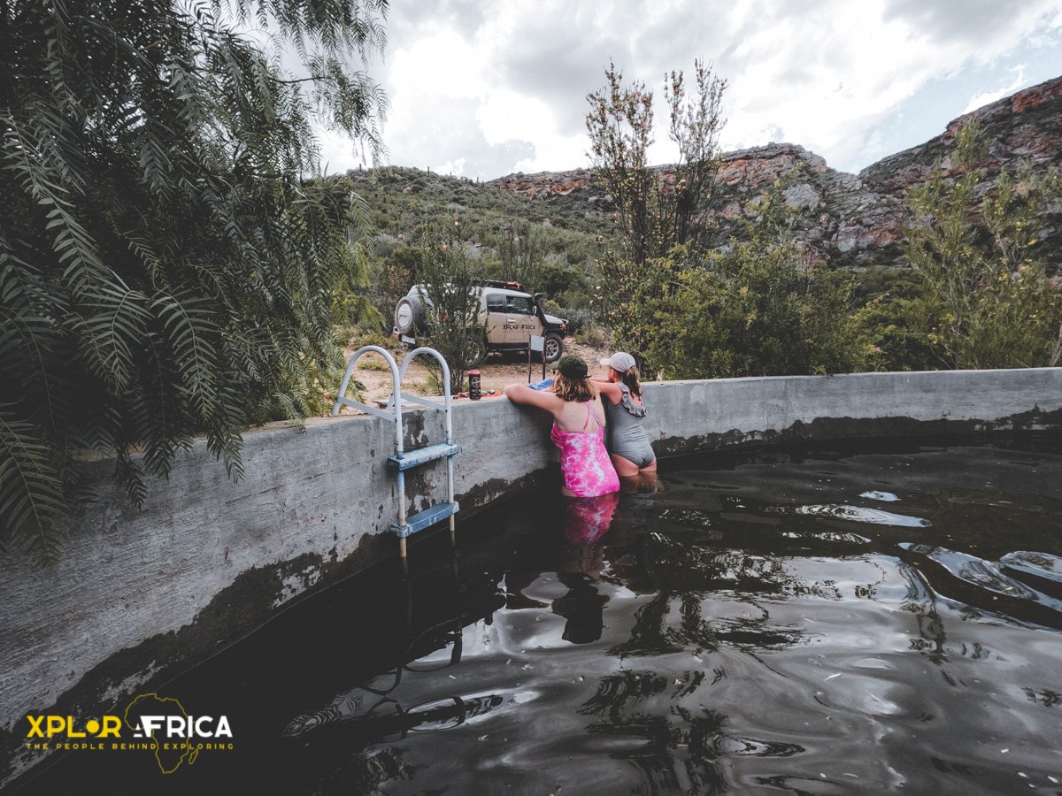 A farm dam and some beers, just the thing you need for the high temperatures at Speekhoutfarm in the Baviaanskloof. Enjoying this quality family time.

#speekhoutfarm 
#farmdam 
#swimmingtime 
 #travelling 
#travellingafrica
#xplorafrica 
#baviaanskloof #easterncape