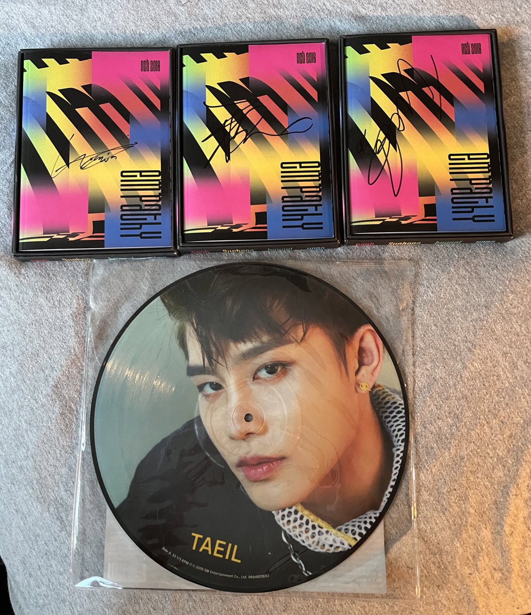 redsunsales's tweet photo. A couple of photos of the signed albums and Taeil we are superhuman vinyl https://t.co/984jEwtw72