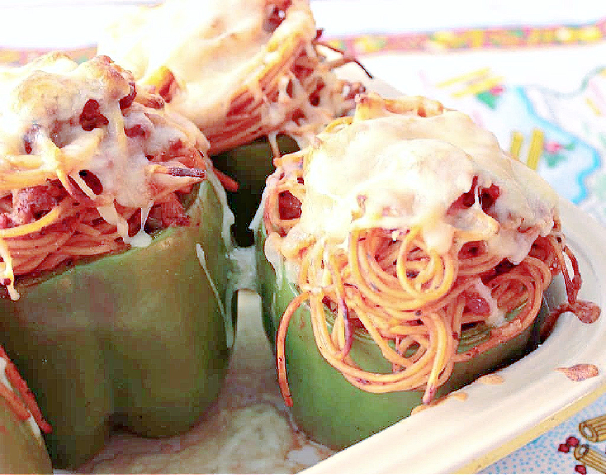 Looking for a new "twist" on serving spaghetti? Look no further. Spaghetti Stuffed Bell Peppers will surprise and delight the entire family. #NationalSpaghettiDay #dinnertonight #dinnerrecipe kudoskitchenbyrenee.com/spaghetti-stuf…