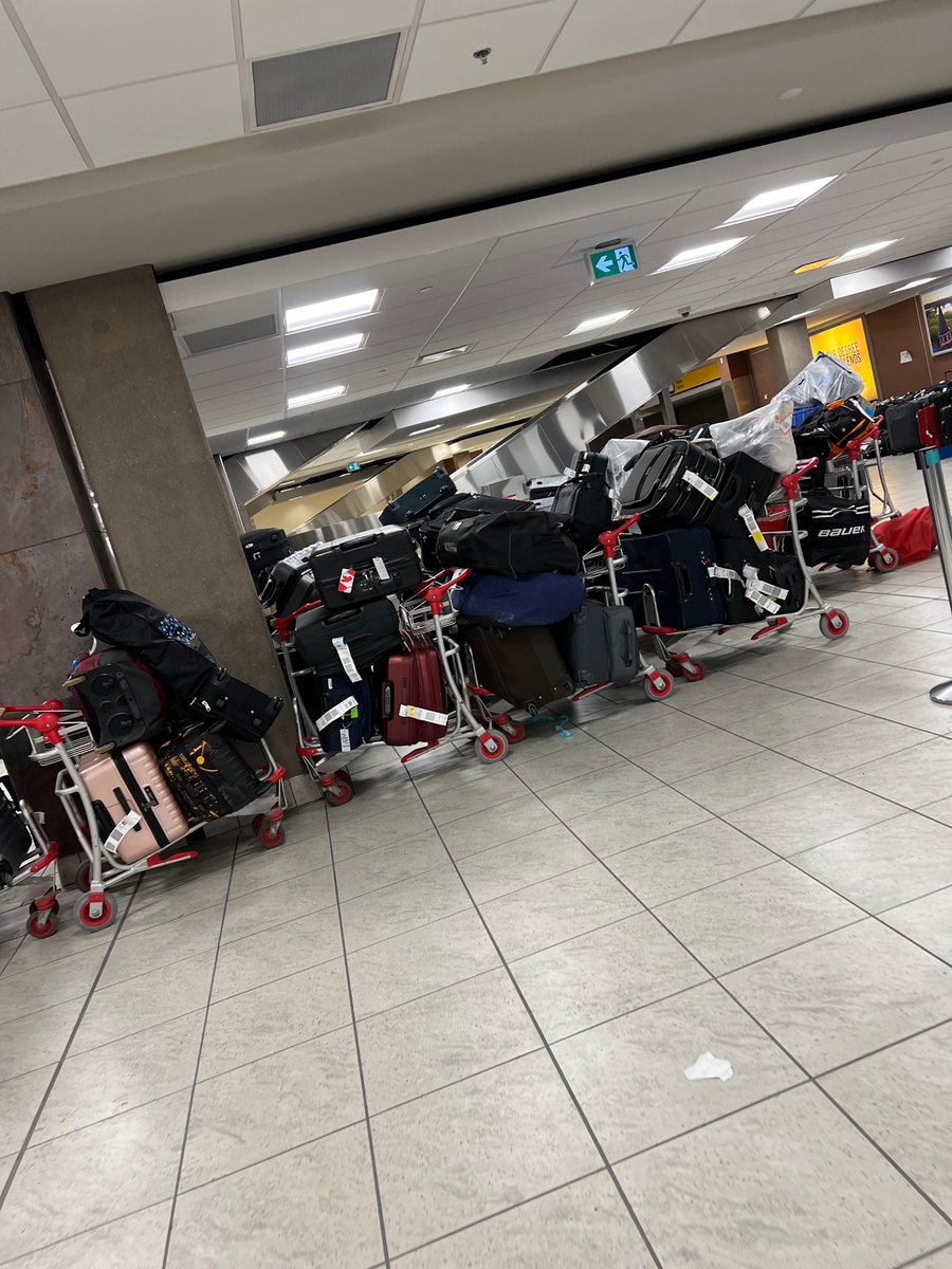 caparici76's tweet photo. @WestJet Here’s the view for 2022 at Calgary Airport. Hundreds of luggage being held by you. We arrived to Saskatoon on Sunday without our luggage. I want my luggage and you are holding it hostage. Who does that?  We supported you and went on trip @WestJet respond https://t.co/LXhVdjDAqP