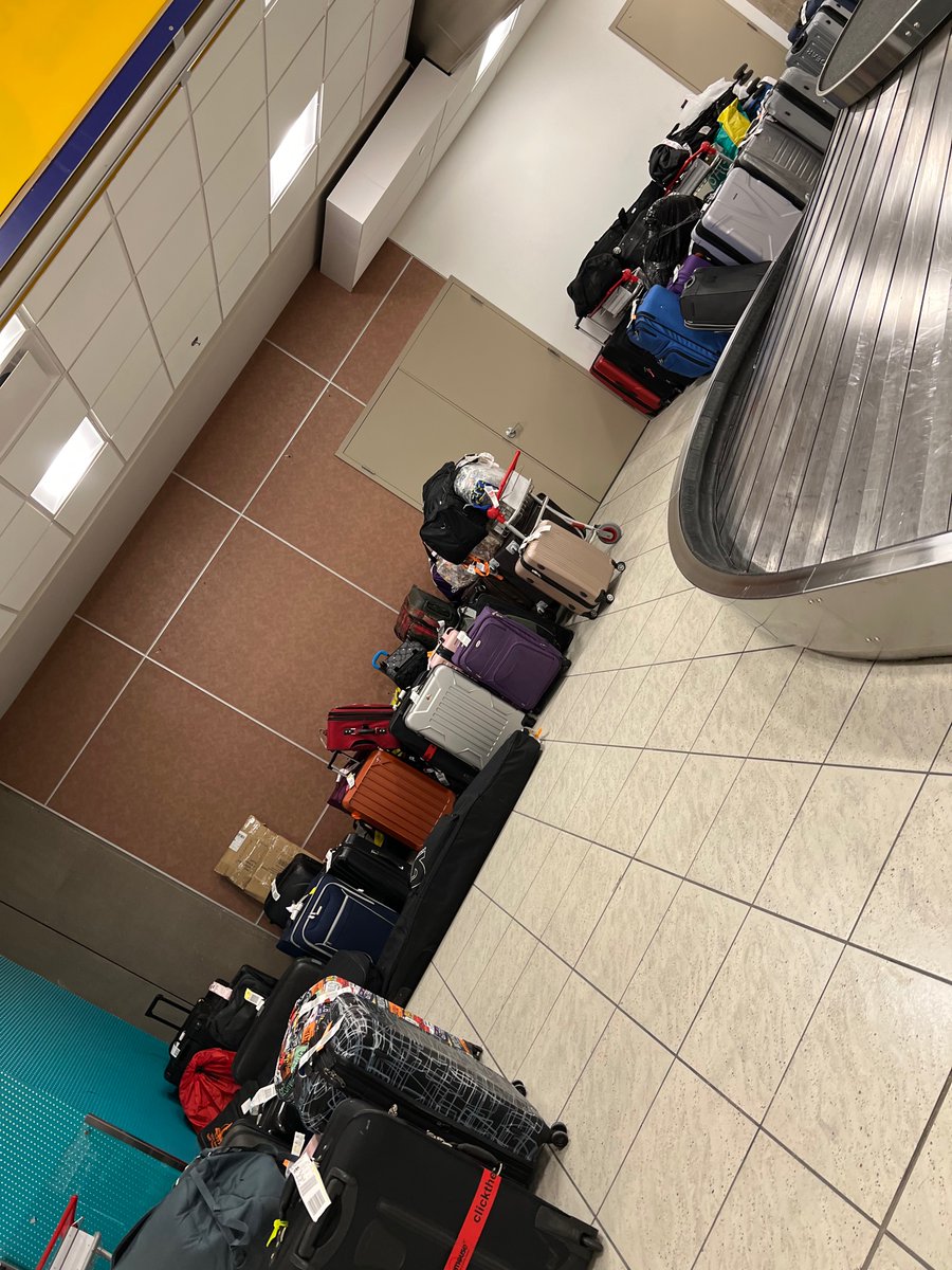 caparici76's tweet photo. @WestJet Here’s the view for 2022 at Calgary Airport. Hundreds of luggage being held by you. We arrived to Saskatoon on Sunday without our luggage. I want my luggage and you are holding it hostage. Who does that?  We supported you and went on trip @WestJet respond https://t.co/LXhVdjDAqP