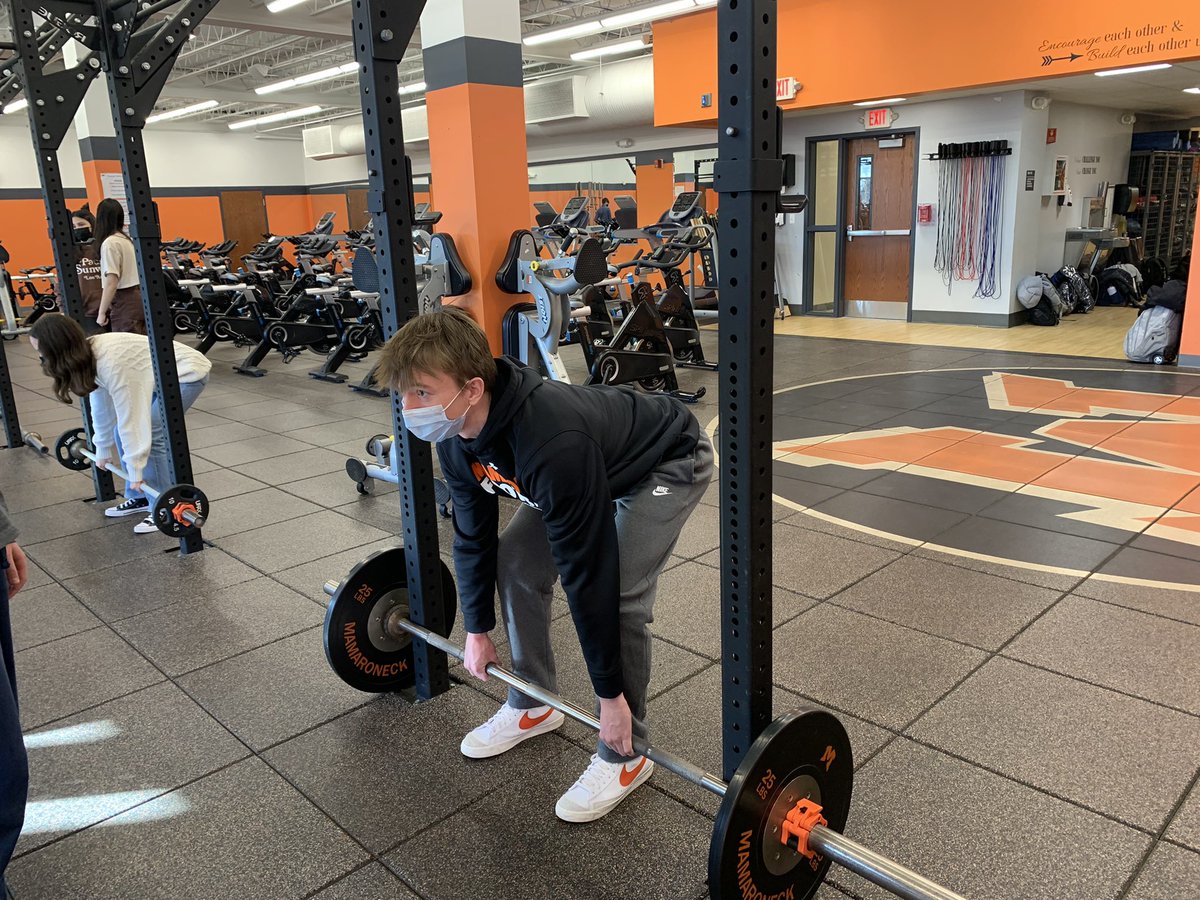 MHSPhysEd's tweet photo. Freshmen PE is learning the fundamental movement of the deadlift. We are using our wonderful rig set up to modify the movement. This modification allows for increased form development for our students. Great job Henry! https://t.co/VV8GT8Y9Kd