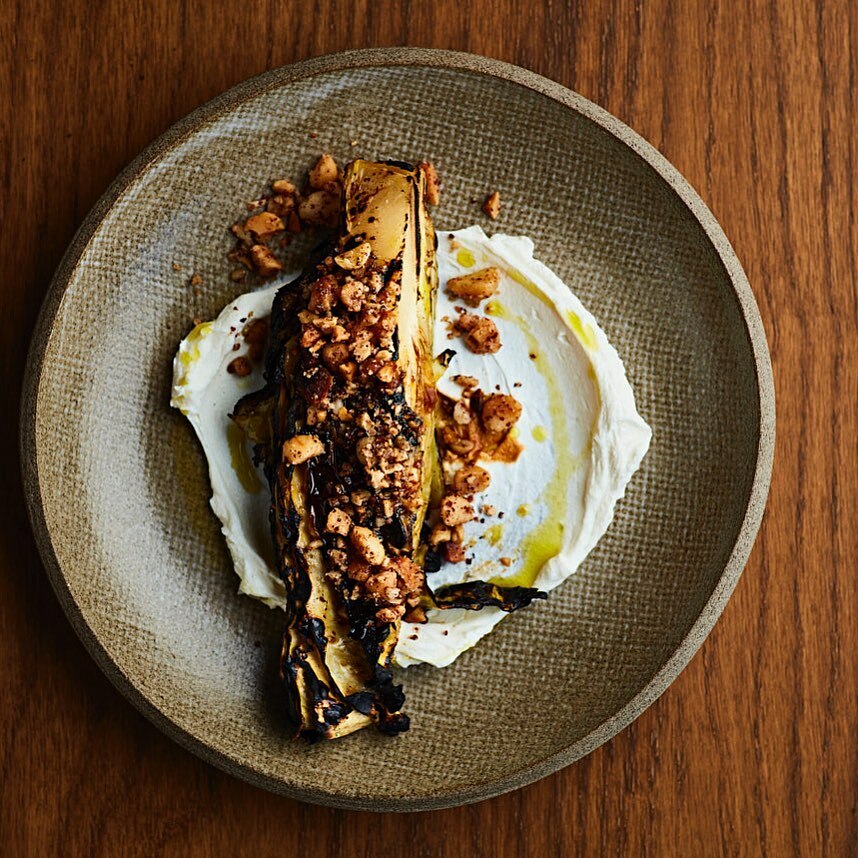 Charred hispi, labneh, macadamia dukkah, ras al hanout &amp; pomegranate mustard molasses. 🔥

Back open from 6pm tonight @carmelrestaurantldn with space at the counter for walk ins 🤘...

📸 @stevenjoycephoto 
.
.
.
#carmel #queenspark #newopening #launch … instagr.am/p/CYUO3OyoR2o/