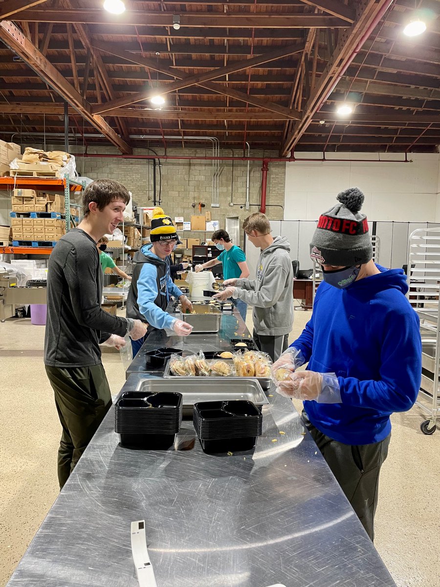 CultivateRescue's tweet photo. Thank you to the @South_Bend_FC who packaged over 500 meals this morning! You rock! https://t.co/ktlik9sBbR