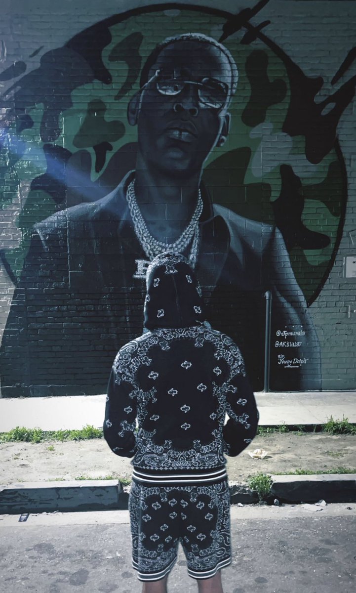 Key Glock visits Young Dolph's mural