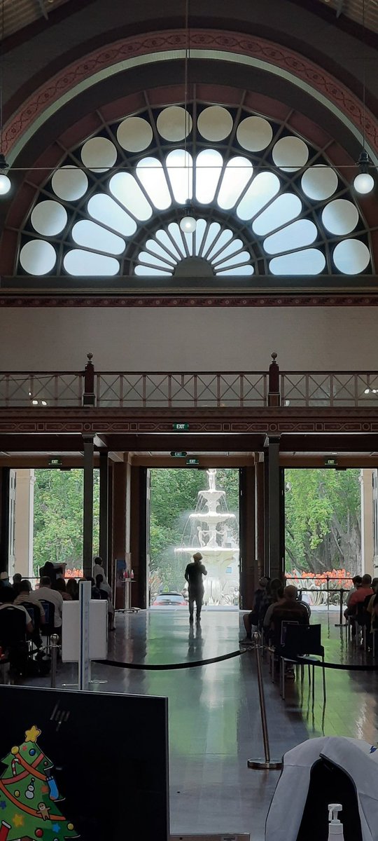 olympiamusic's tweet photo. Covid booster lines are short at Royal Exhibition Building. Did not even get through the intro of a Dan Carlin podcast. Open for walk-ins 8am - 8pm. https://t.co/UJWAg3yWkF
