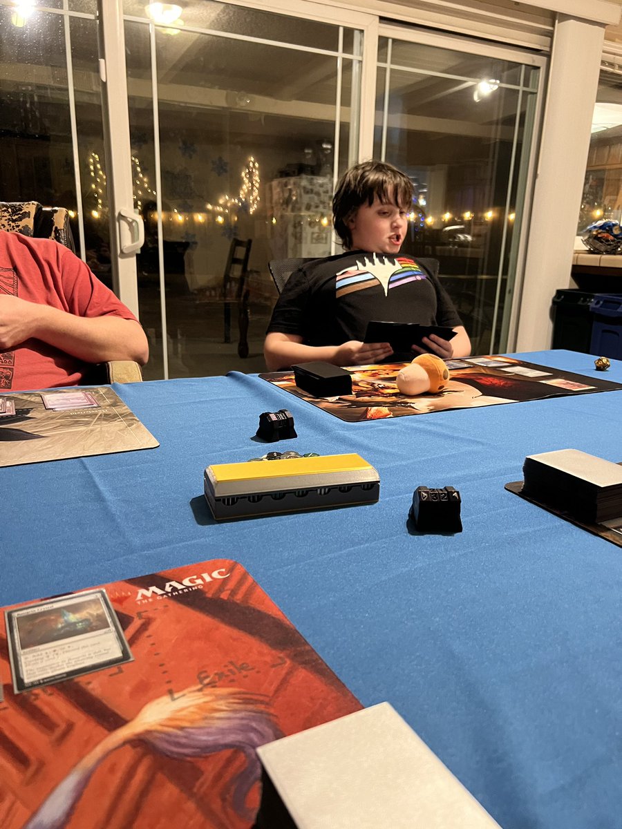 plusultrapotat's tweet photo. Last night I looked up and realized Jaxen actually had on his MTG shirt while playing MTG. The dudes kicked our butts, still had tons of fun. #MTGFamily #TwoHeadedGiant #DeckTesting https://t.co/GXO3shn2P0