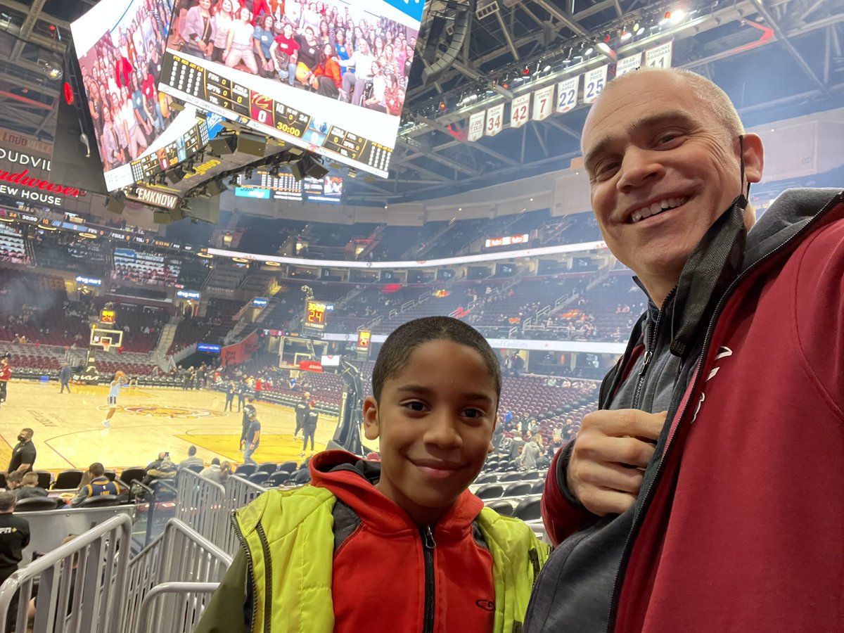 MathRemix's tweet photo. Out here cheering with my son for the Cavs. #LetEmKnow Happy 9th birthday O. #teamjenkins https://t.co/cqQVzI8TG9