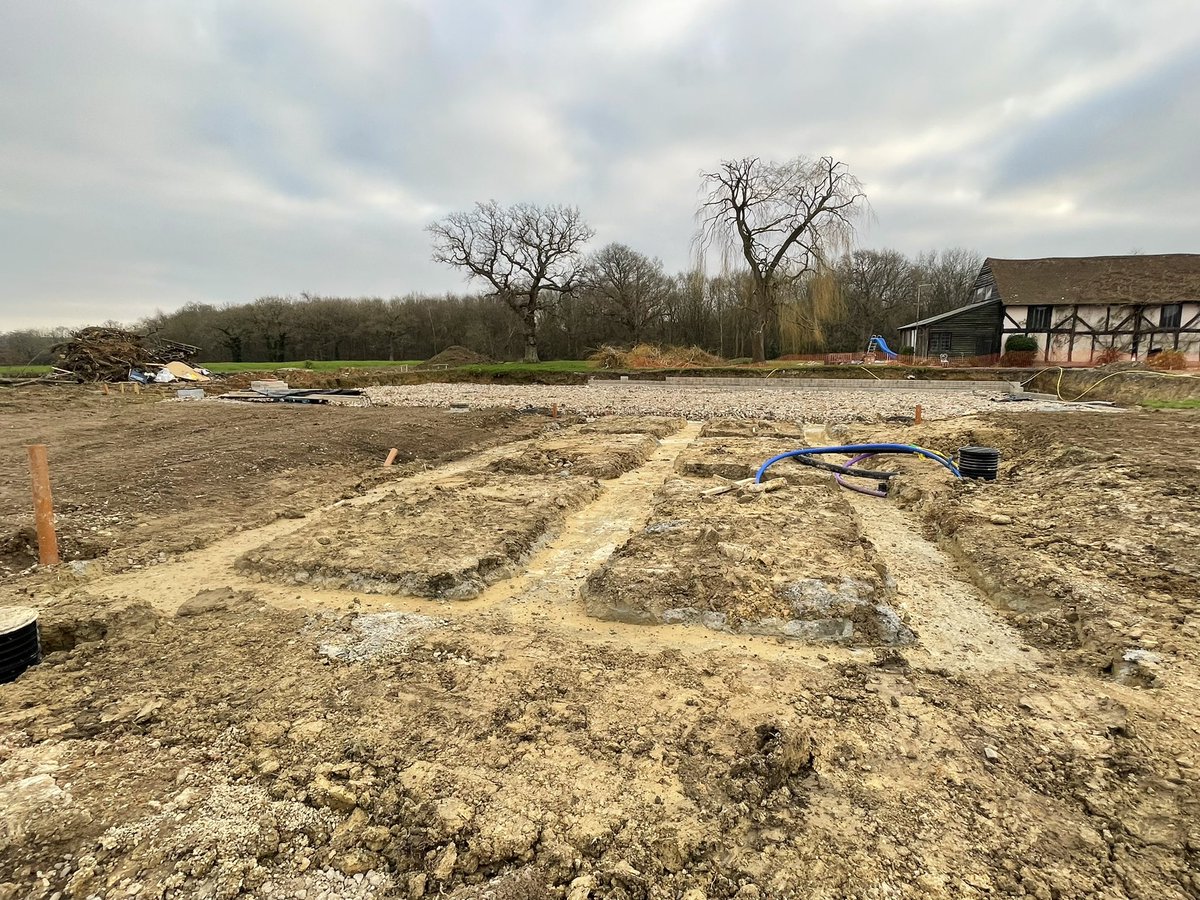 OmurcaLtd's tweet photo. Footings poured just before Christmas and retaining walls started at our new project. we are proud to have won this oak frame, exposed beams and stone facade new build. This project has a tennis court and external landscaping. #oakframe #newbuild #newbuildhomes #construction https://t.co/SnA3rhg1SW