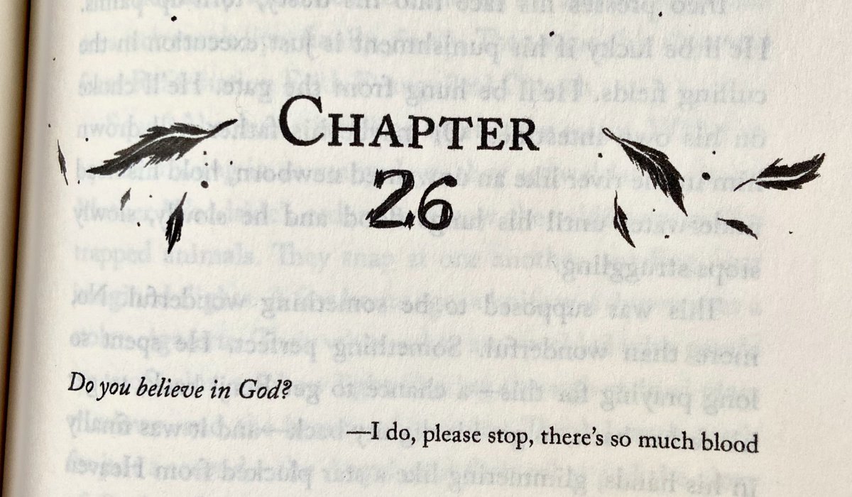 A photo of a book page decorated with feathers. It reads: “Chapter 26. Do you believe in God? I do, please stop, there’s so much blood.”
