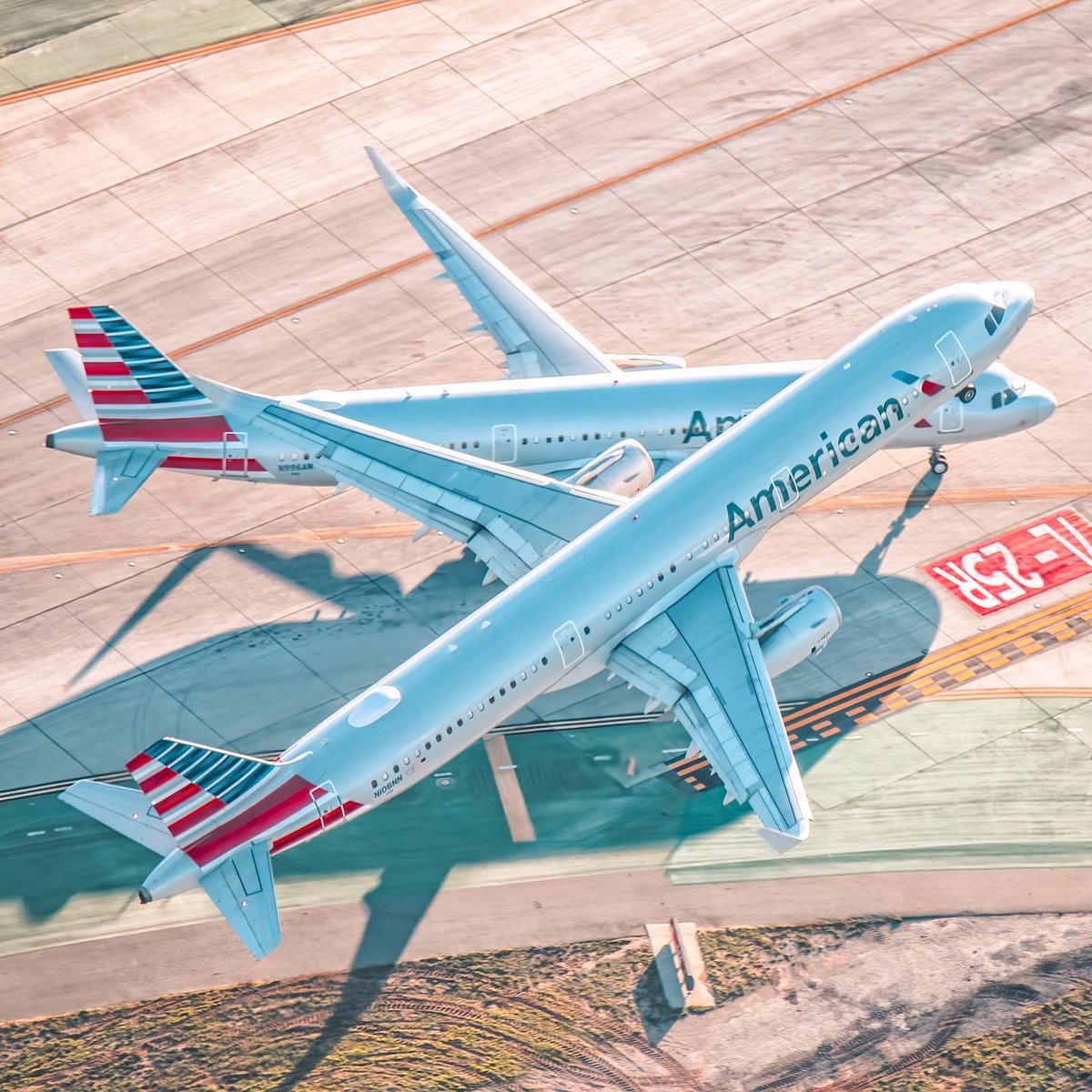 diecastryan's tweet photo. Gotta look twice! An American Airlines A321 taking off from LAX. #americanairlines #aviation #avgeek #aerialphotography https://t.co/TtBCbdb1fx