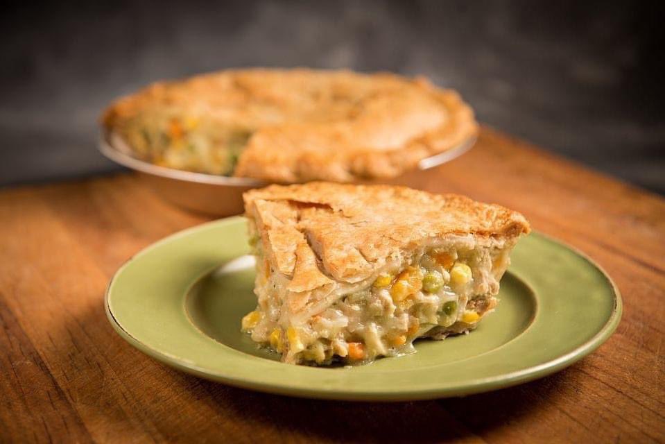 On cold winter days warm up with a yummy slice of our homemade chicken pot pie 🥧 😋