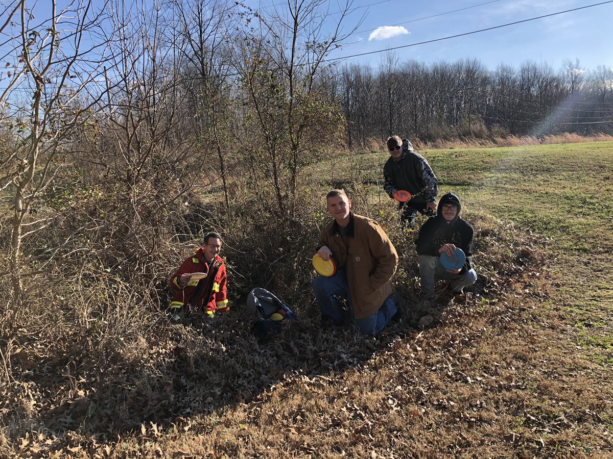 RenfrowFit's tweet photo. FHS Disc Golf enrichment with 3 of our Law Enforcement seniors and Chief Birt. A little bushwhacking was called for! Great Lifelong hobby! @meme3rat @FairdaleHigh #FHSReal https://t.co/3M1jYuS79C