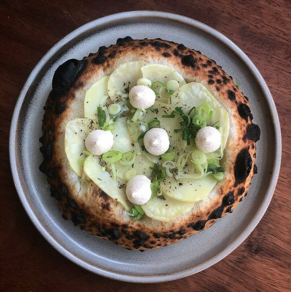 Our tarama flatbread @carmelrestaurantldn with potato, cod roe, rosemary and spring onion; a coming together of great minds, our Head Chef @oren_g_chef 🔥💥💣 and our Head Baker Mike Li, who doesn’t have an Insta account but does have next level baking … instagr.am/p/CYWp873osUe/