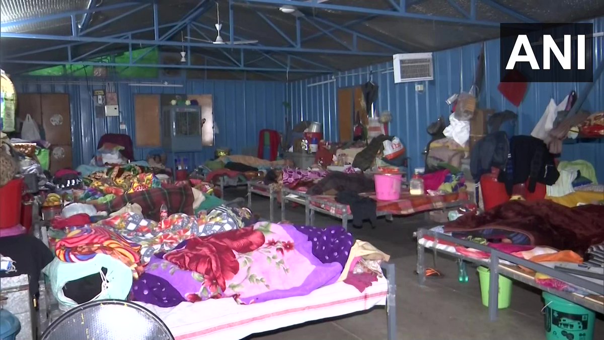 ANI's tweet photo. Delhi: People take refuge at a night shelter in Lodhi Road, as temperature dips in the national capital

"Today many people are coming here because of the rain. We provide them many facilities including blankets, hot water, medicines," says Manoj Kumar, caretaker of the shelter https://t.co/pMf6ZX5DIH