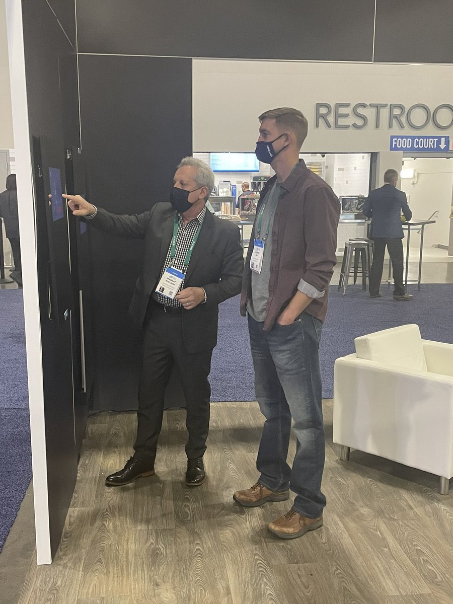 CAPC_Capstone's tweet photo. Stewart Wallach, Capstone's CEO, demos smart mirror for one of its longtime shareholders. Thank you for stopping by the booth. We appreciate your support! #capstoneconnected #smartmirror #capstonethincast #CES2022 https://t.co/glJY9EtW3W