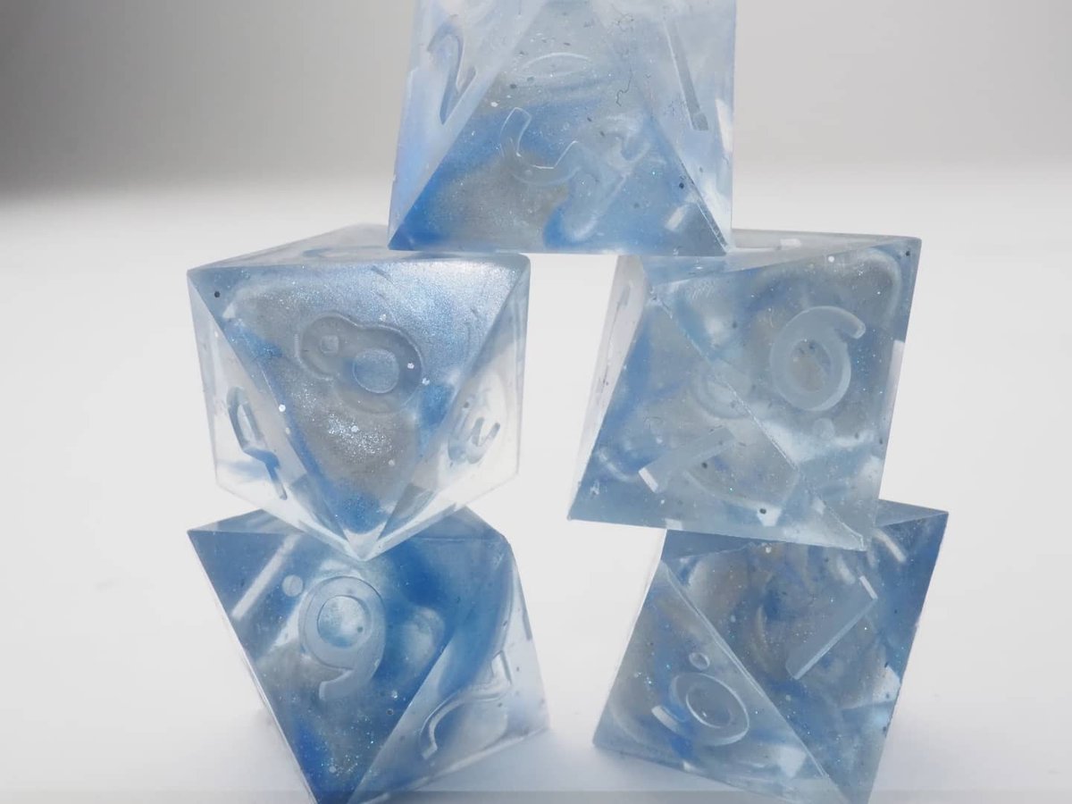 CatInTheDiceBag's tweet photo. Here are some more "#Dunamancy #Nightsky" #dice. Inside of the #resin are some #glitter flakes for the #stars and some silver and blue swirls, which give you the mote of possibilities.
(Ad)
#handmadedice #dnd #dnd5e #diceset #epoxy #rpg #ttrpg #würfel https://t.co/0oiov5X3Ih