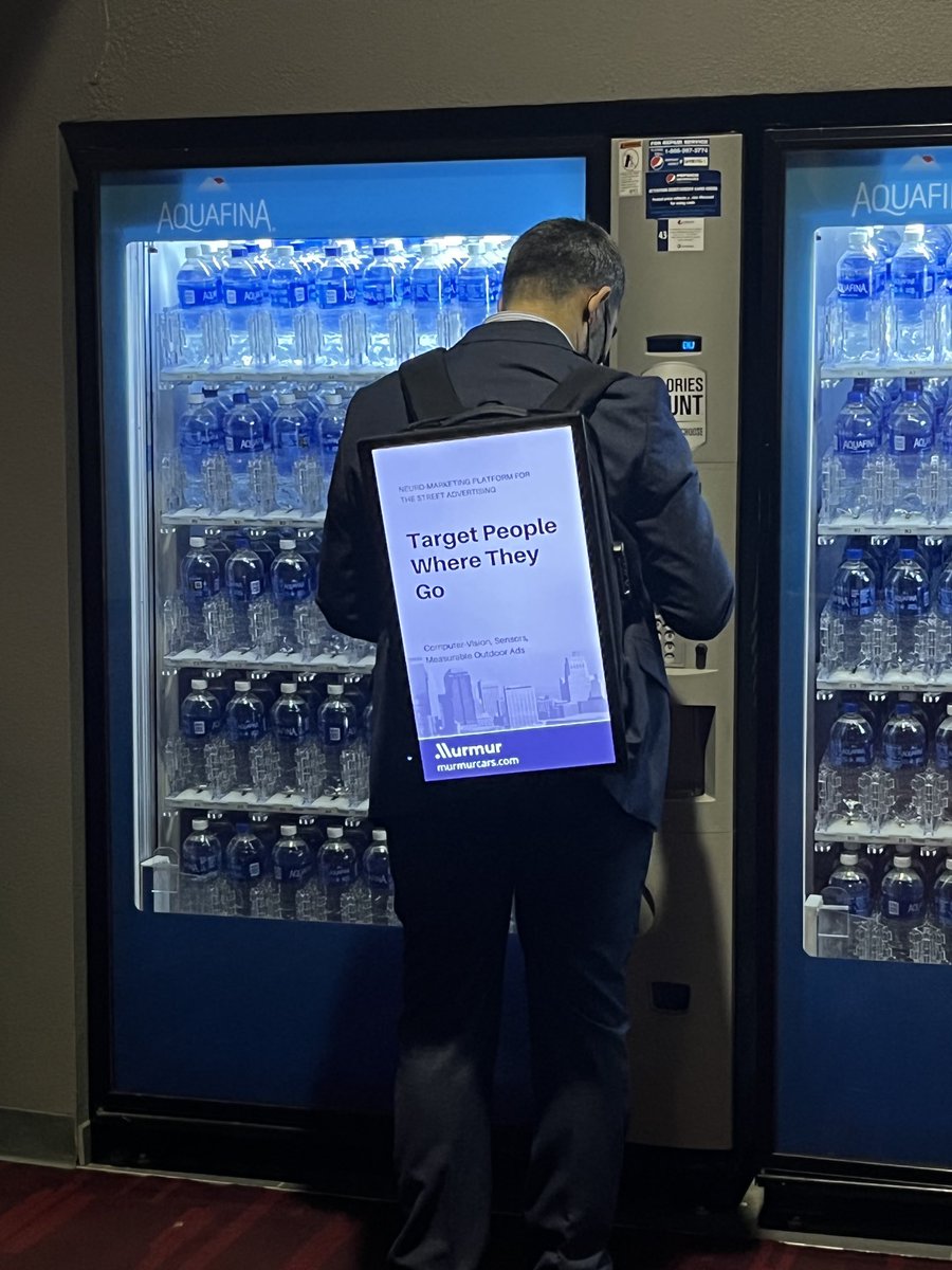 This is a level of brand dedication that I'm not quite sure I have in me.   BUT mad props to him for literally carrying his brand on his back! #talesfromtheshowfloor #CES2022