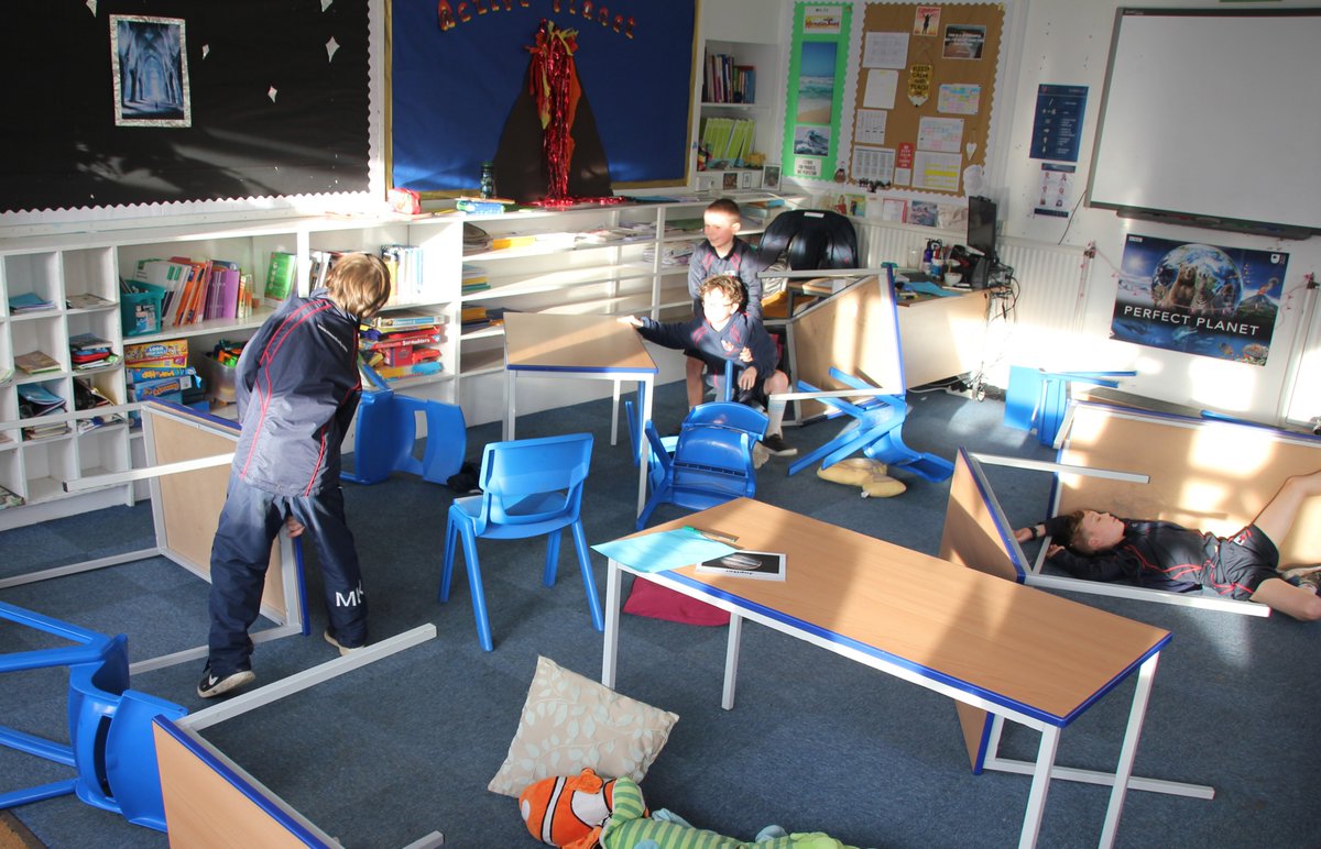 Mount_Kelly's tweet photo. Year 3 pupils threw themselves into their IPC #ActivePlanet entry point this week, when an 'earthquake' hit Mount Kelly. The children planned and implemented a rescue operation covering emergency first aid, childcare, registration and clean-up. Excellent teamwork was on display! https://t.co/w4ALRBgfXn