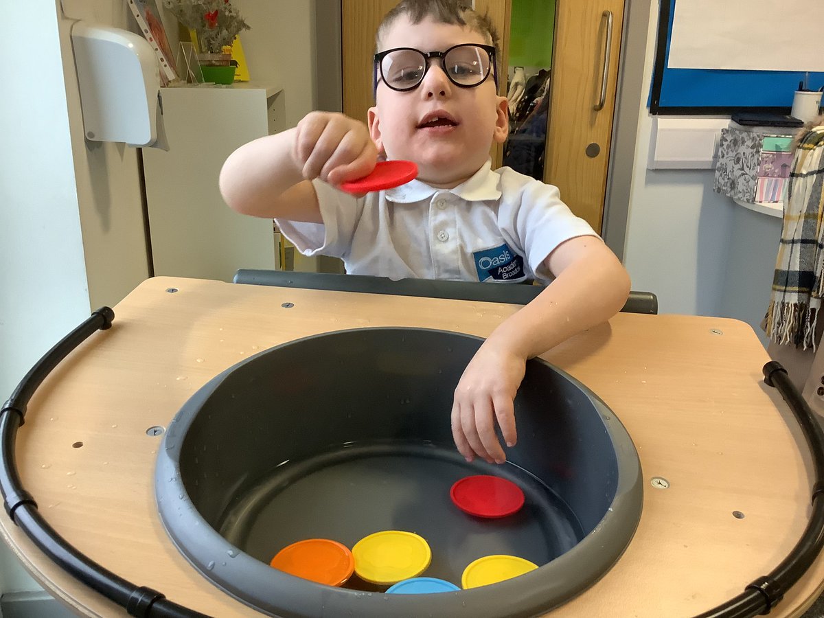 OABroadoak's tweet photo. This morning Sonny has been doing maths with some number counters in water. #mathsisfun #standingframe #Y1 https://t.co/E6RCJL3ADI