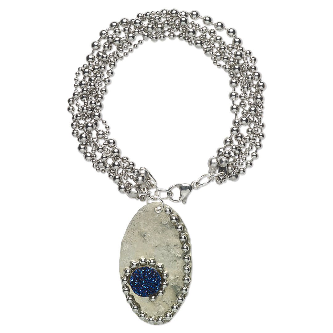 FireMtnGems's tweet image. This chunky bracelet design is all about the chain. Almost like a planet at the heart of a galaxy, the chain also spirals down and around the bright, electroplated druzy stone: bit.ly/3G25MKd
#galaxy #chainjewelry