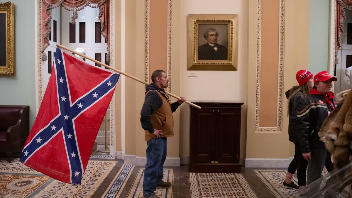 #January6th 2021 was the first time in history that the battle flag of failed racist treasonous terrorists who tried to destroy the United States 160 years ago flew inside our nation’s Capitol. #NeverAgain