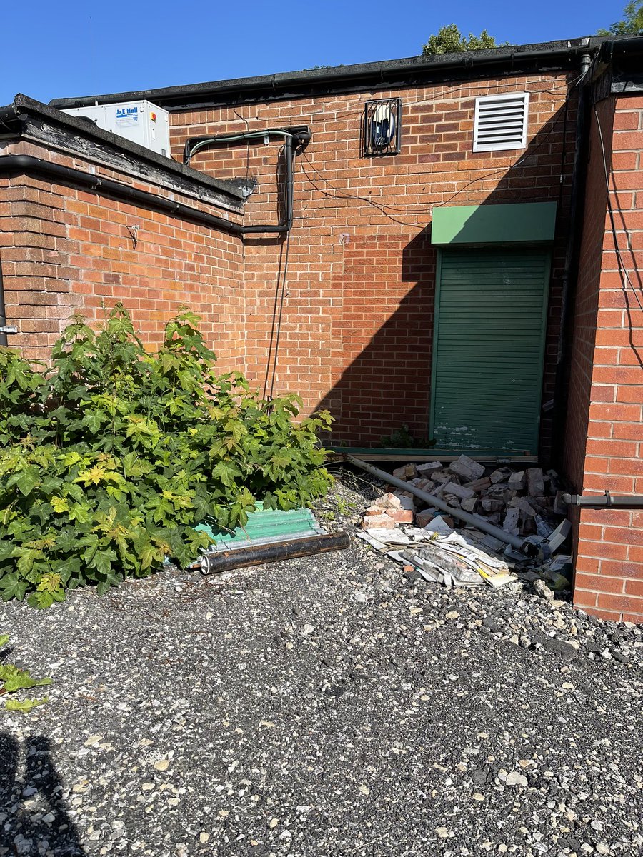 salnewton's tweet photo. @costcutter is this your idea of standards, leaving rubbish and junk around neighbouring shops then cleaning the filthy doormat on my salon walls?…thought you’d like to know the bricked up door is the fire escape! https://t.co/KJRM7MtbKX