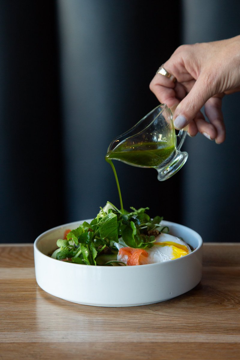 Lunch is served. ⚡️ Salmon Salad Quinoa & fresh herb tabbouleh, cucumber ribbons, watercress, rocket, smoked salmon trout and a soft poached egg. #BootleggerCoffeeCompany #SustainableLiving