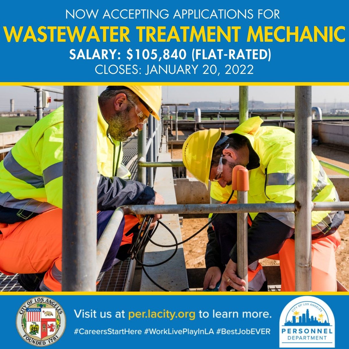 Two men in safety gear work on top of a wastewater holding tank.