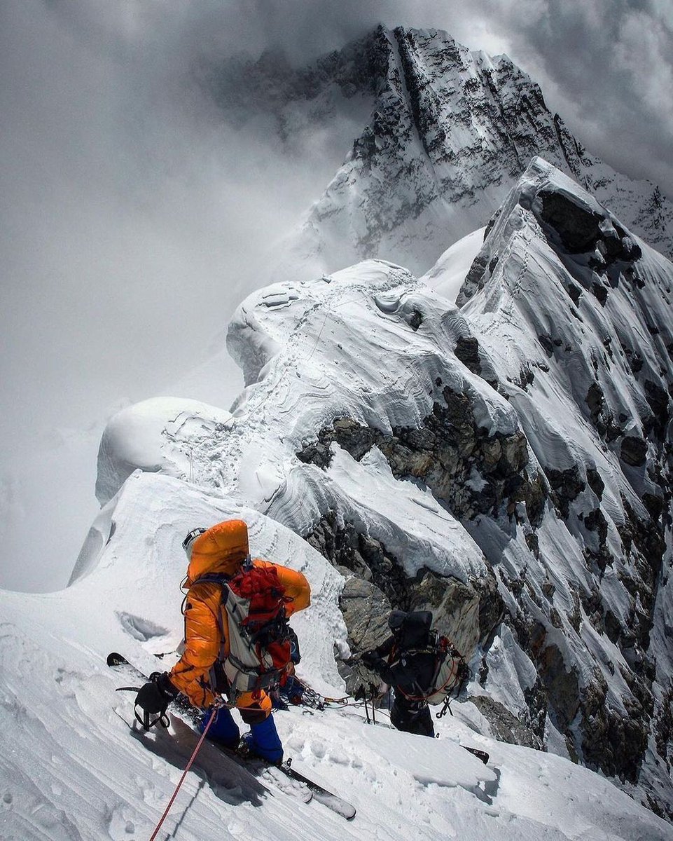 jimkchin's tweet photo. Dropping in at 28,500 ft.

@kitdski and @robdski prepare to rappel the Hillary Step during our ski descent on the southeast ridge of Everest. https://t.co/JAxrOZc4Fa