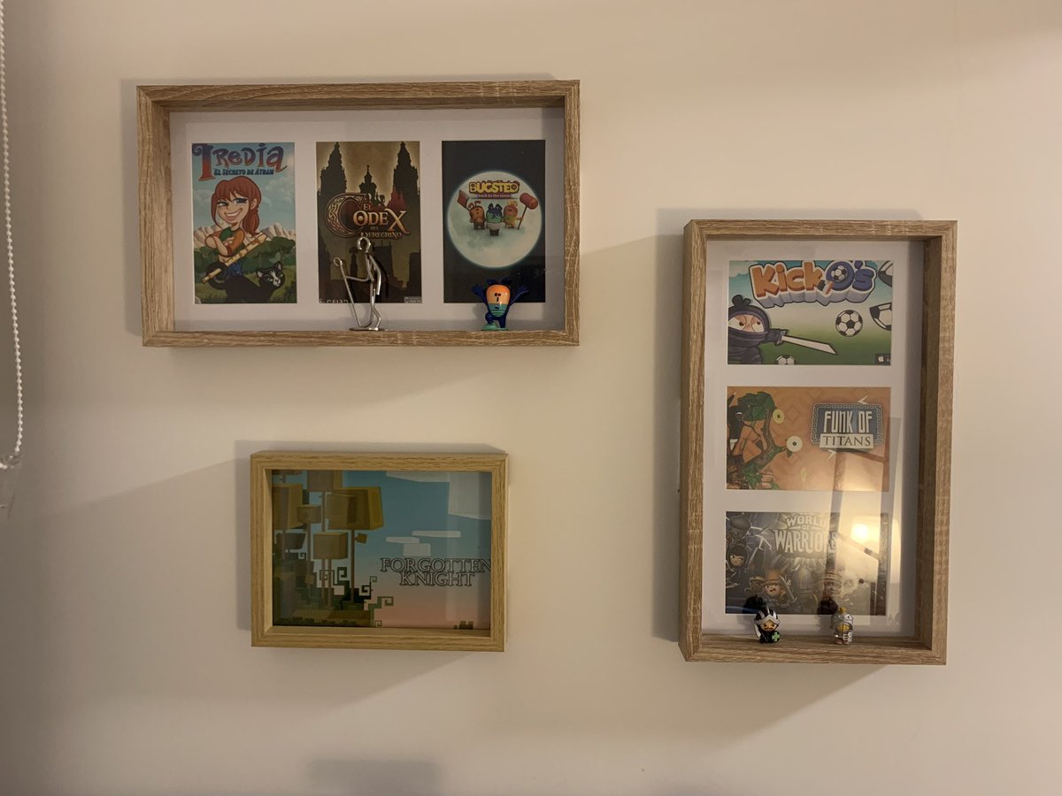 AlejoSilos's tweet photo. My whole portfolio is now on my wall!! :) So many stories to tell from all those games… and many more to come. My wife is amazing! https://t.co/CJreYEL4ni