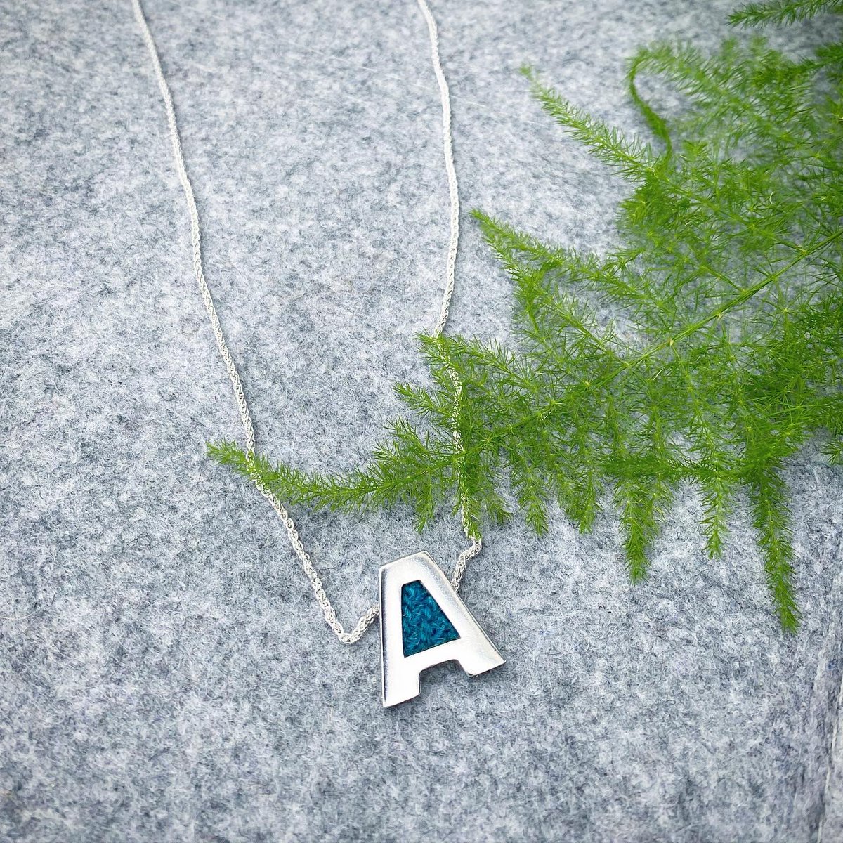 ruthamorrison's tweet image. Letter A Necklace with Harris Tweed #initialpendant #initialnecklace #handmadenecklace #silvernecklace #harristweed #outerhebrides #isleofharris #bespokejewellery #jewellerydesigner ruthamorrison.com