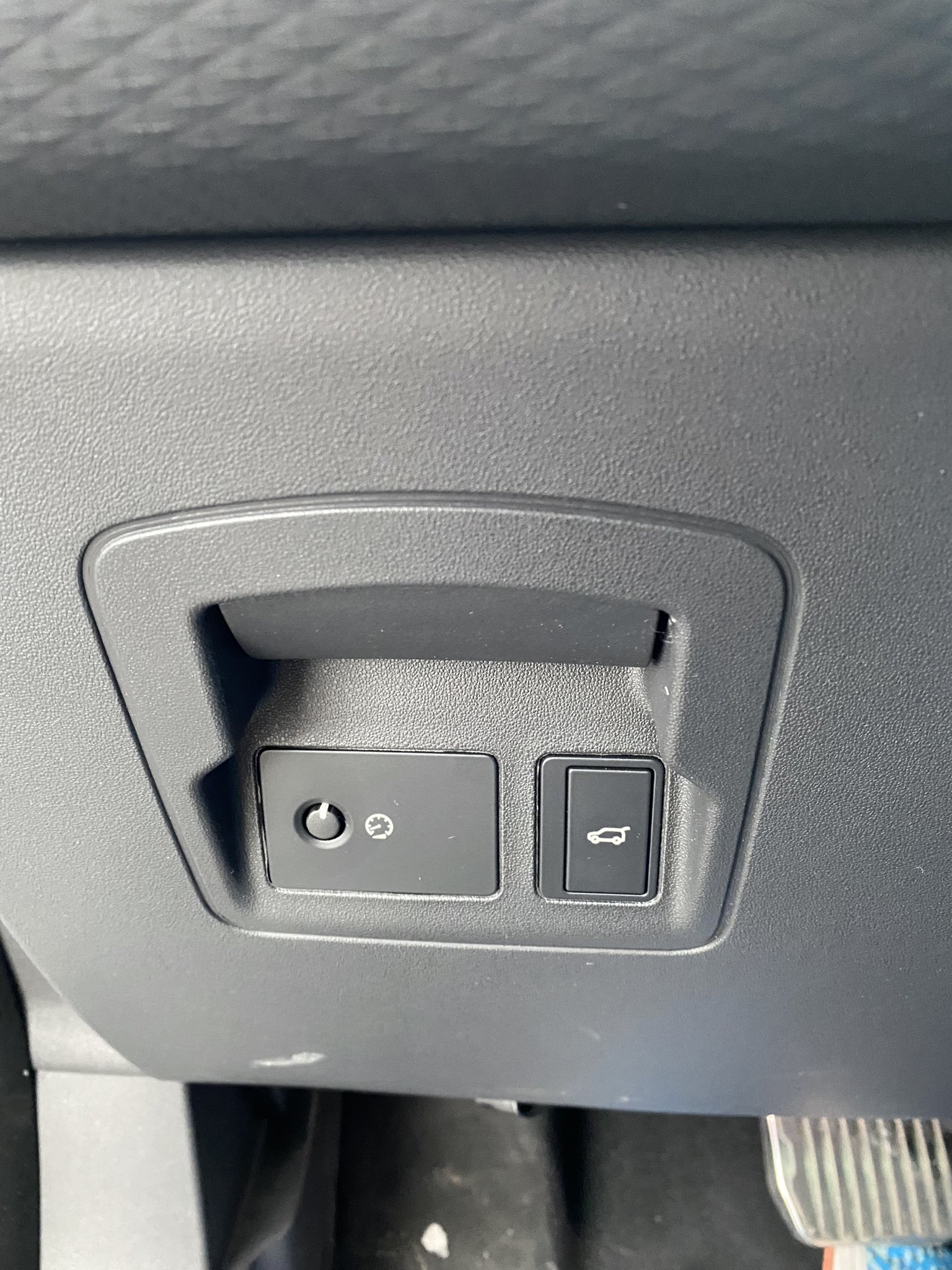 The land rover has a lever for the parking brake, another to shift