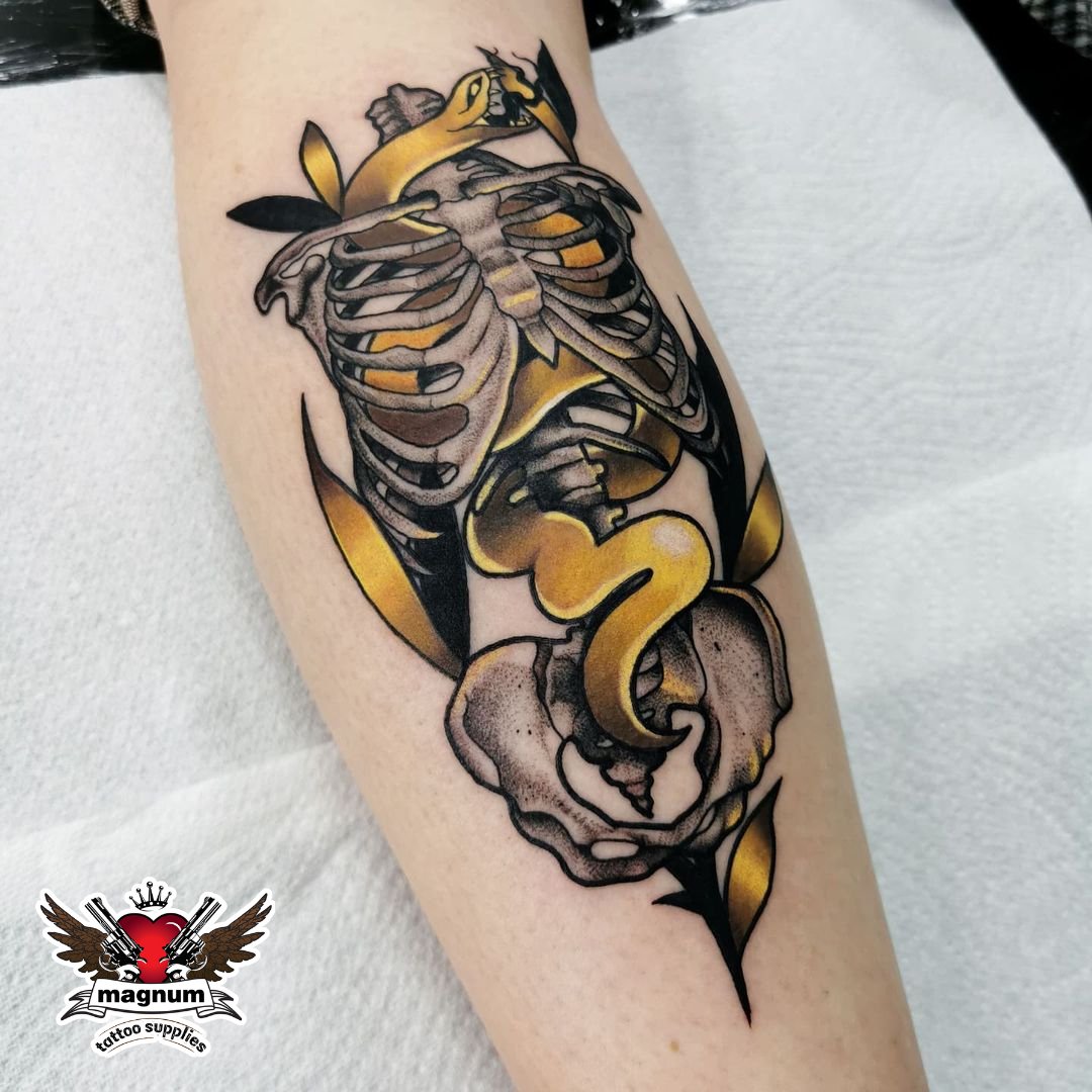 MagnumTattooSupplies on X: "Killer golden snake tattoo by Jessica Delaforce done using #magnumtattoosupplies . . #goldtattoo #goldensnake # snaketattoo #bonetattoo #darkart #stippledtattoo #skellington #uktta #margate #tattoo #tattooartist https://t ...